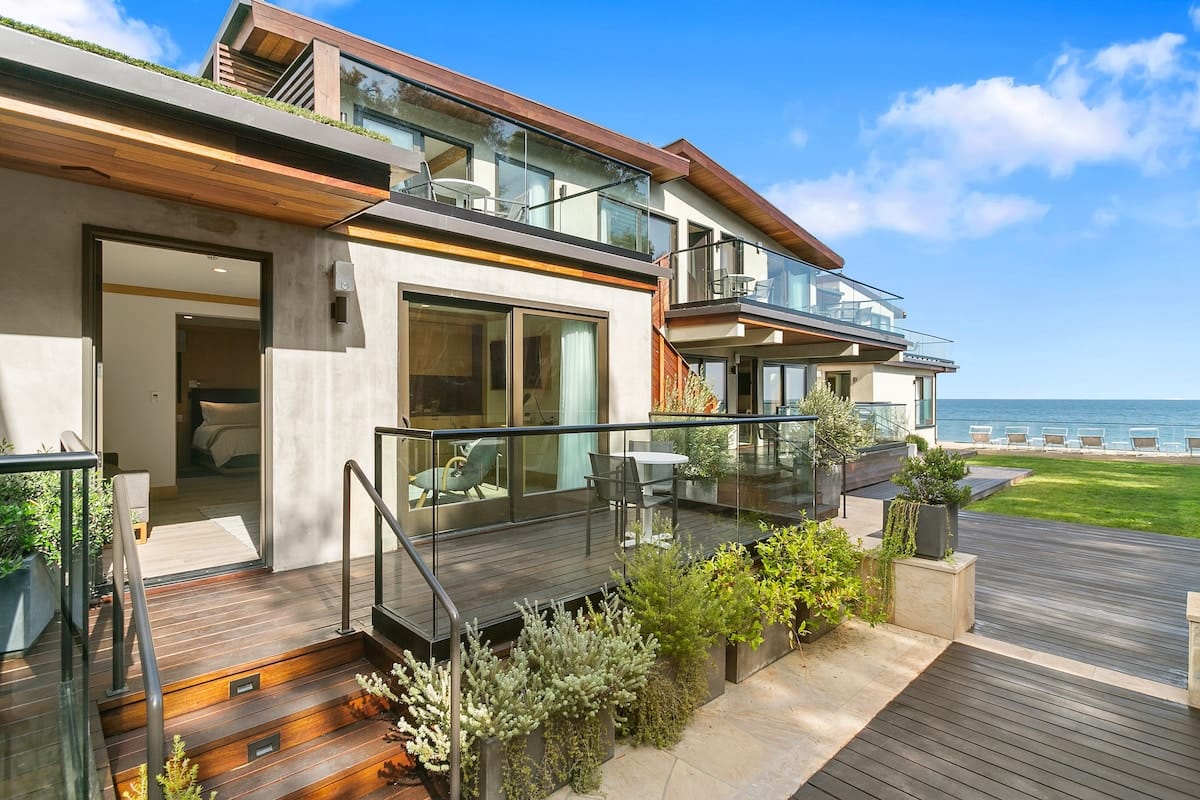 A sunlit retreat where each moment is framed by the sea hero image