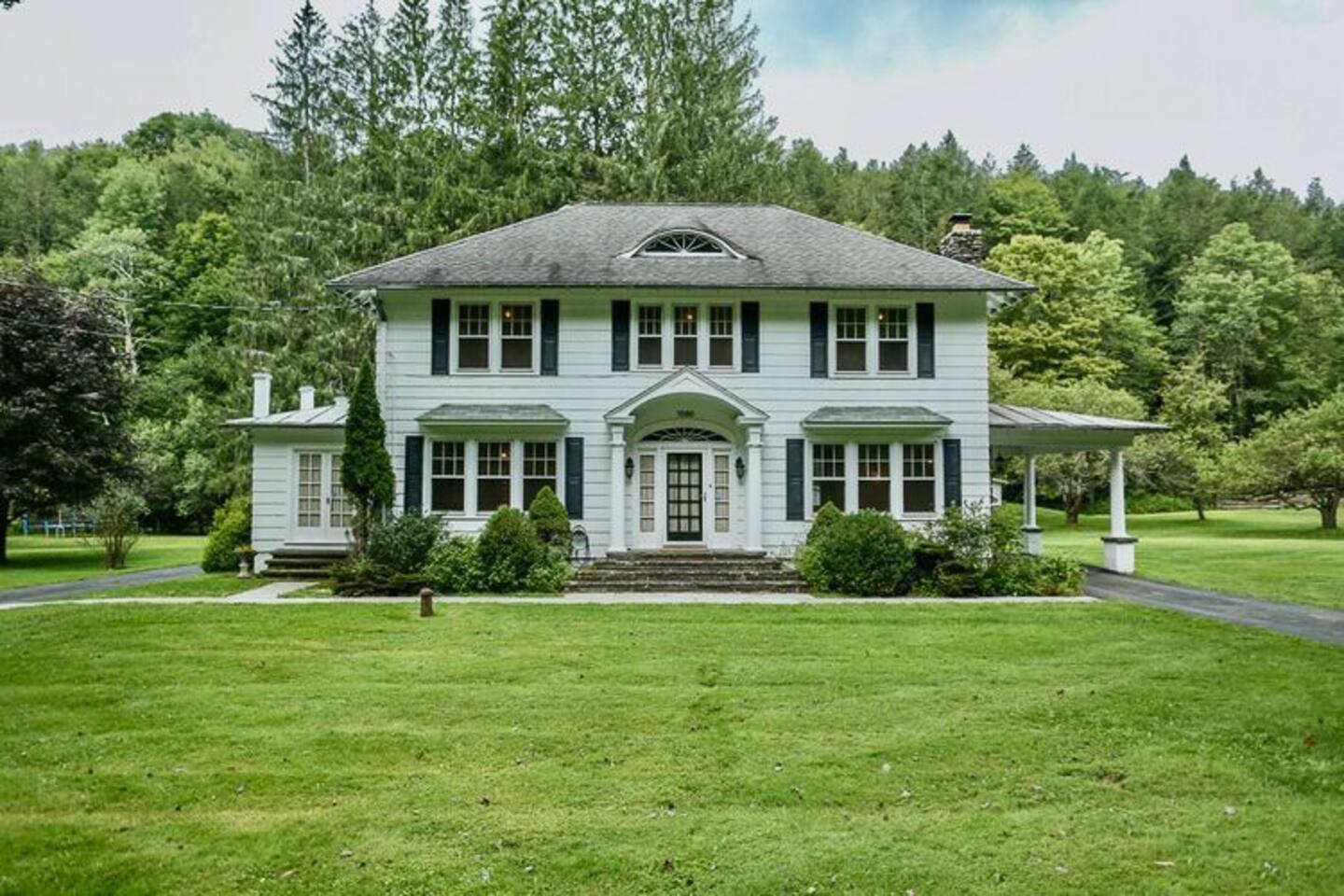 An enchanting haven surrounded by rolling meadows hero image